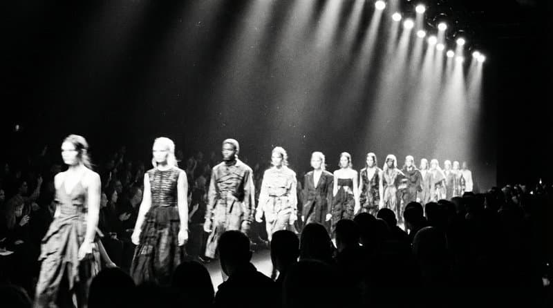 Atelier in motion — fashion-domain AI works alongside human craft, not on top of it